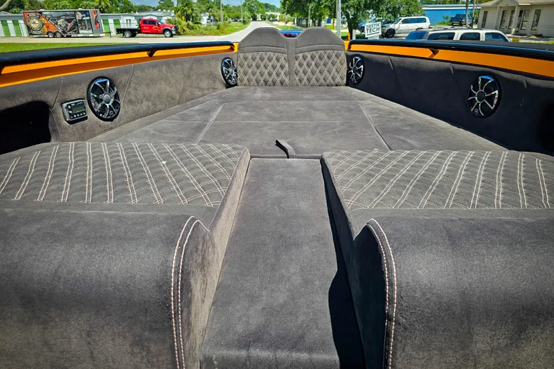 Slide: The Image of Luxurious interior of 2016 Statement 380 Open boat with plush seating and speakers. - 20