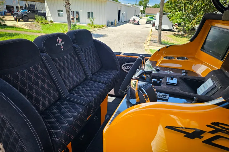 Slide: The Image of Interior of 2016 Statement 380 Open boat with luxurious seating and modern controls. - 25