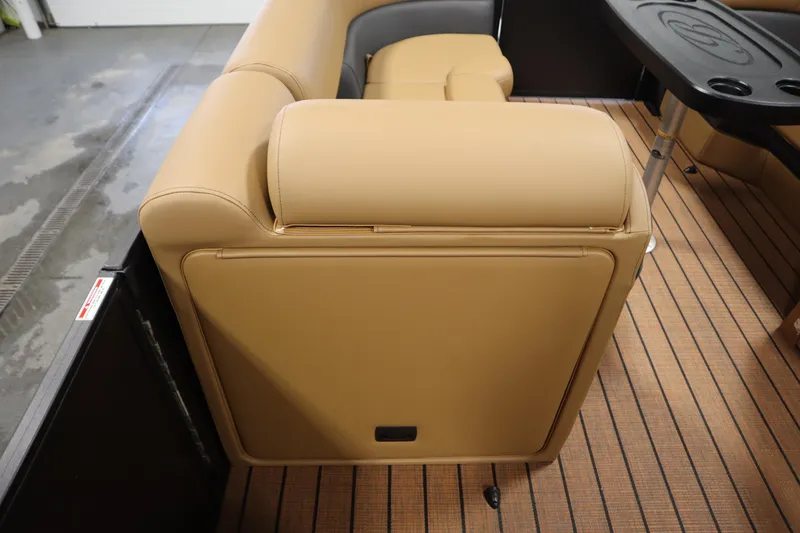 Slide: The Image of 2026 Bentley Pontoons Elite 223 Admiral Tri-toon interior with tan seating and table. - 17