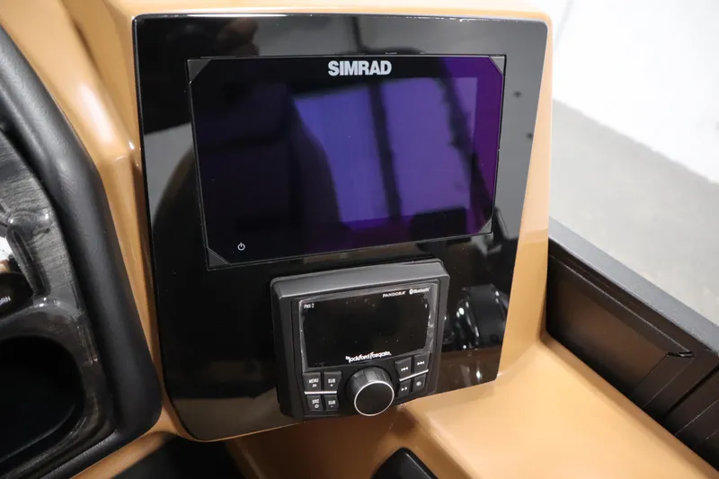 Slide: The Image of 2026 Bentley Pontoons Elite 223 Admiral Tri-toon dashboard with Simrad display and controls. - 25