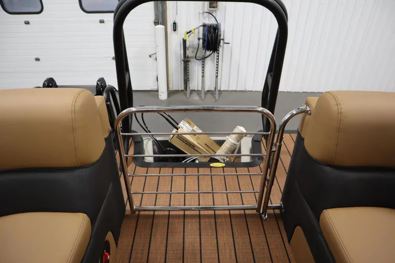 Slide: The Image of 2026 Bentley Pontoons Elite 223 Admiral Tri-toon interior with tan seating and metal railing. - 37