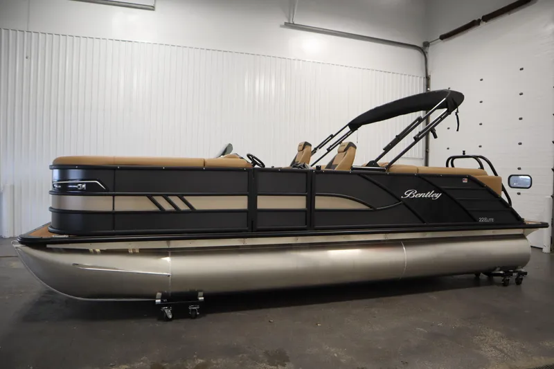 Slide: The Image of 2026 Bentley Pontoons Elite 223 Admiral Tri-toon in showroom, side view. - 7