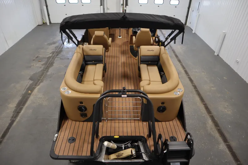 Slide: The Image of 2026 Bentley Pontoons Elite 223 Admiral Tri-toon with luxurious seating and sleek design. - 9