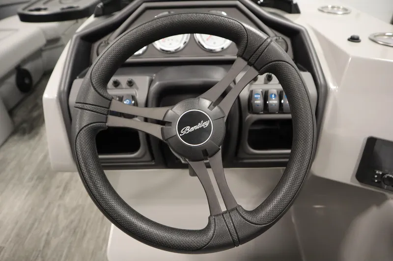 Slide: The Image of Interior of 2026 Bentley Pontoons Elite 223 Swingback with table and seating. - 20