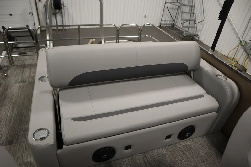 Slide: The Image of Interior of 2026 Bentley Pontoons Elite 223 Swingback with luxurious seating. - 29