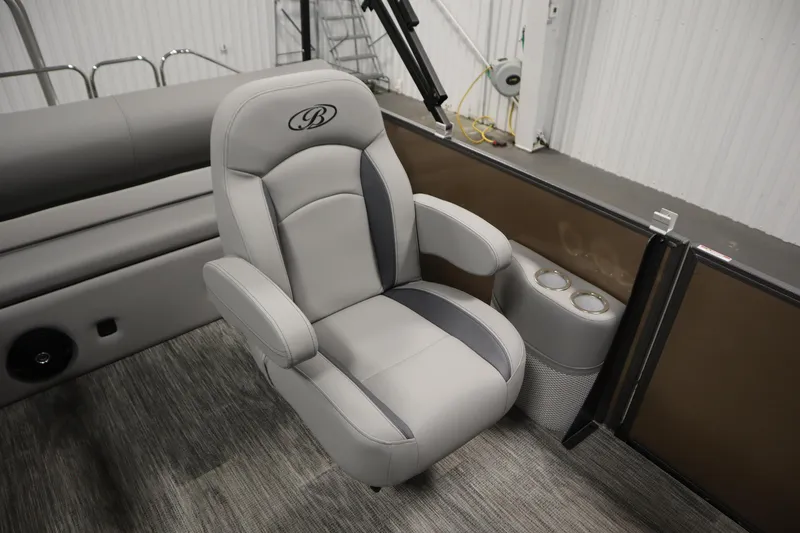 Slide: The Image of Luxurious seating on 2026 Bentley Pontoons Legacy 223 Swingback Tri-toon, featuring cup holders. - 26