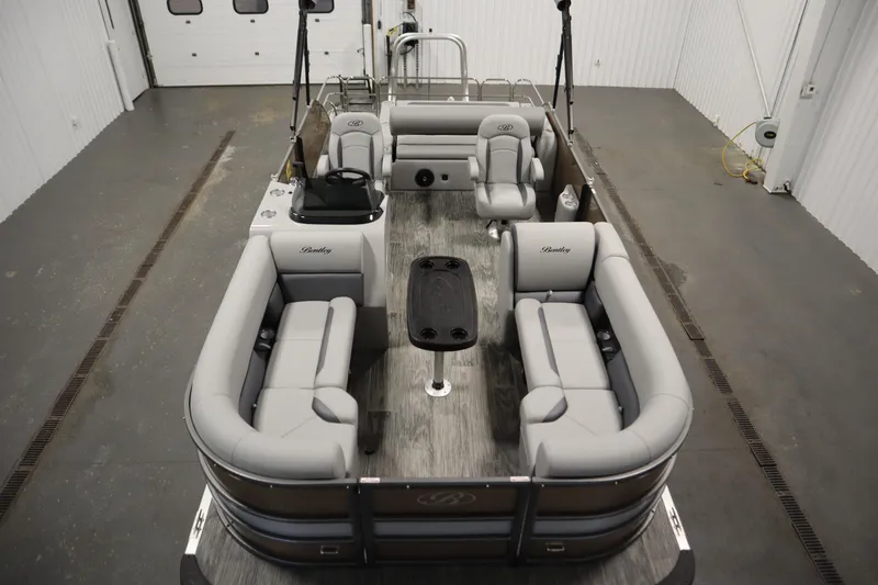 Slide: The Image of 2026 Bentley Pontoons Legacy 223 Swingback Tri-toon with luxurious seating in a spacious interior. - 8