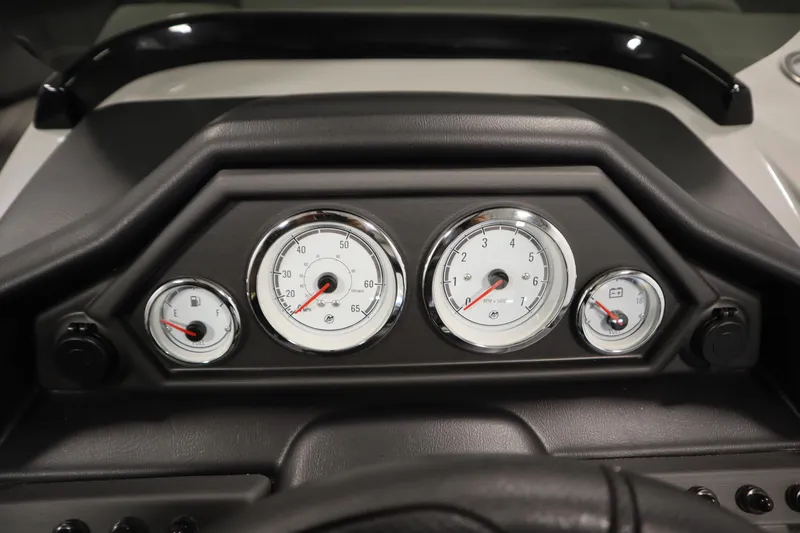 Slide: The Image of Dashboard of 2026 Bentley Pontoons Legacy 223 Navigator Tri-Toon with gauges and controls. - 21