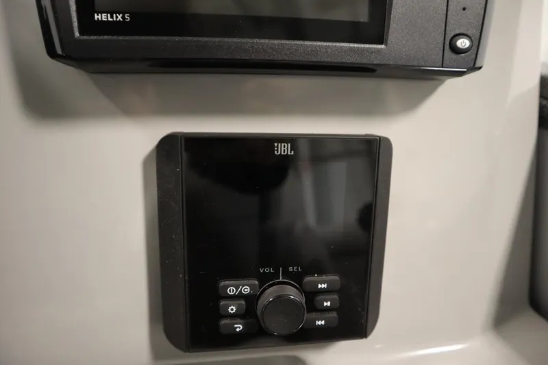Slide: The Image of JBL audio control panel on 2026 Bentley Pontoons LEGACY 223 NAVIGATOR TRI-TOON. - 25