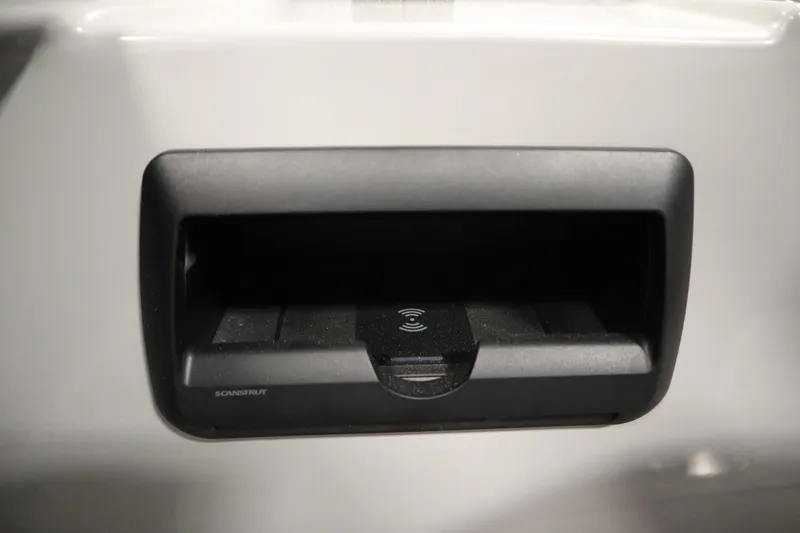 Slide: The Image of Close-up of a Scanstrut wireless charging pad on a 2026 Bentley Pontoons Legacy 223 Navigator Tri-Toon. - 26