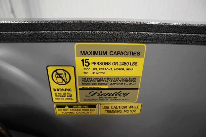 Slide: The Image of 2026 Bentley Pontoons Legacy 223 Navigator Tri-Toon capacity label, 15 persons or 2480 lbs. - 27