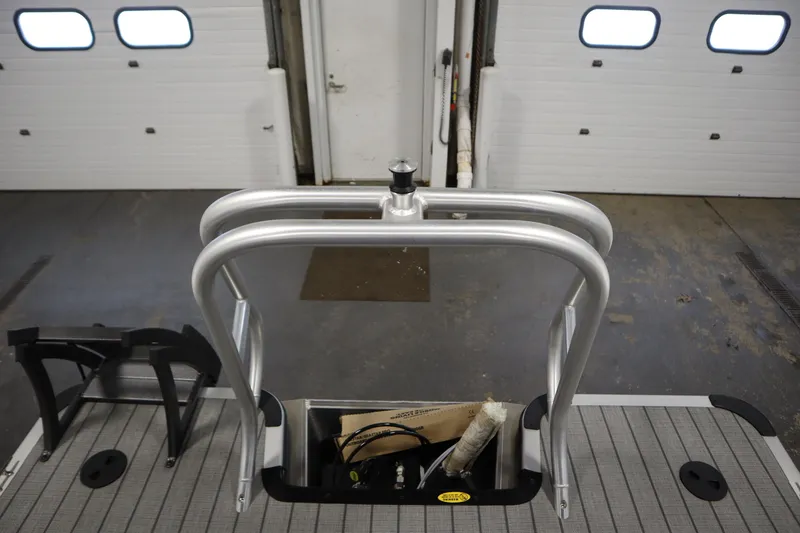 Slide: The Image of 2026 Bentley Pontoons LEGACY 223 NAVIGATOR TRI-TOON rear view in a garage setting. - 37