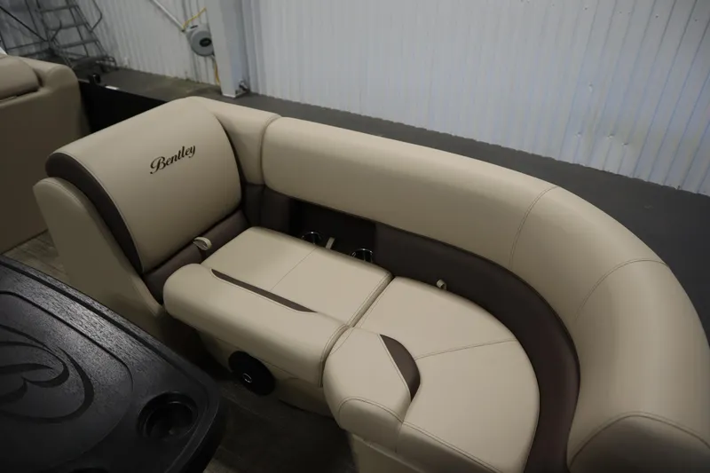 Slide: The Image of 2026 Bentley Pontoons LE 200 CW interior seating, beige and brown upholstery. - 11