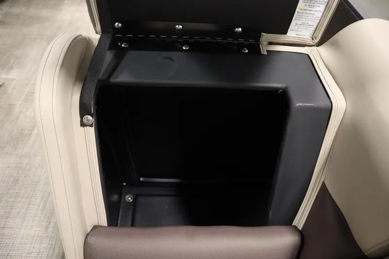 Slide: The Image of 2026 Bentley Pontoons LE 200 CW storage compartment with open lid, showcasing interior space. - 12