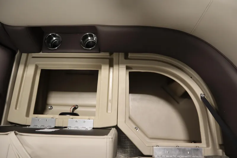 Slide: The Image of 2026 Bentley Pontoons LE 200 CW interior storage compartments with cup holders. - 13