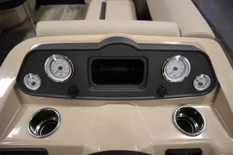 Slide: The Image of Dashboard of 2026 Bentley Pontoons LE 200 CW with gauges and cup holders. - 21