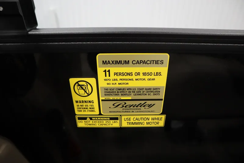 Slide: The Image of 2026 Bentley Pontoons LE 200 CW capacity label, 11 persons or 1850 lbs limit. - 24