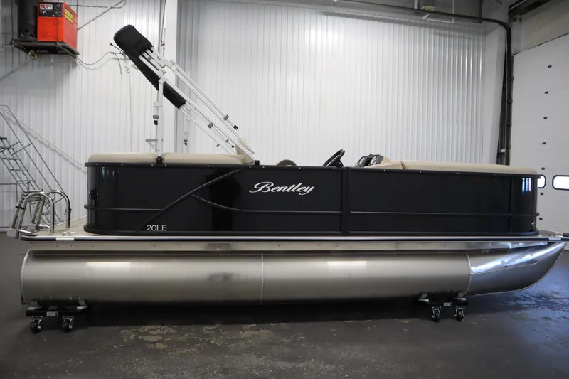 Slide: The Image of 2026 Bentley Pontoons LE 200 CW pontoon boat in a showroom setting. - 3