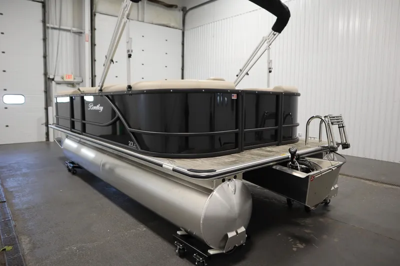 Slide: The Image of 2026 Bentley Pontoons LE 200 CW in a spacious indoor setting. - 6