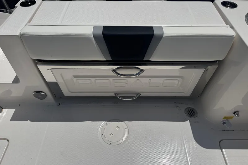 Slide: The Image of 2025 Robalo R250 Center Console boat seat and storage compartment. - 9