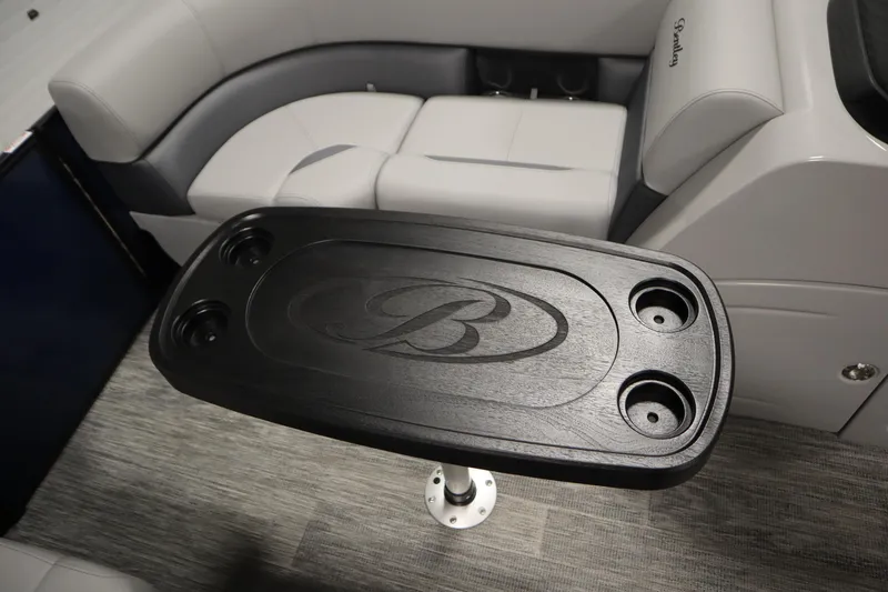 Slide: The Image of 2026 Bentley Pontoons Legacy 200 Cruise XL interior with sleek table and seating. - 15