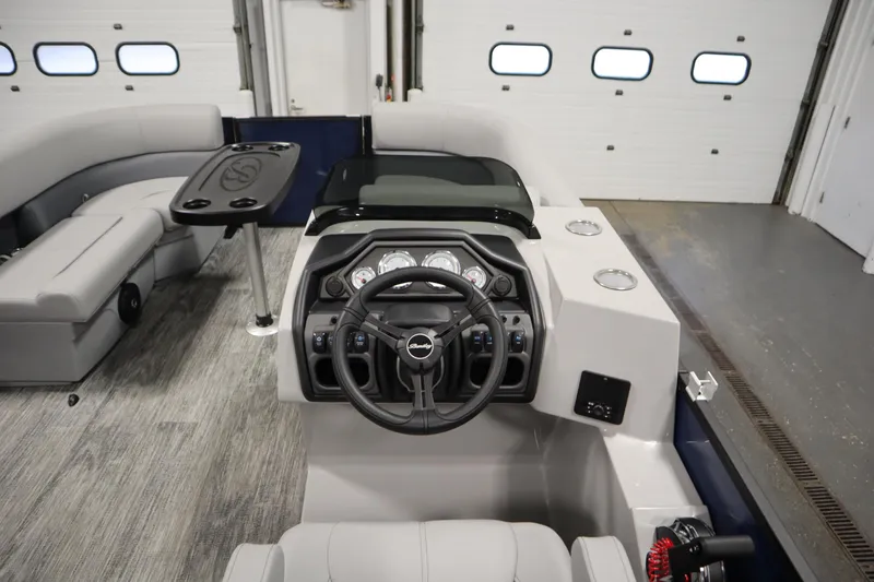 Slide: The Image of 2026 Bentley Pontoons Legacy 200 Cruise XL interior with modern helm and seating. - 18