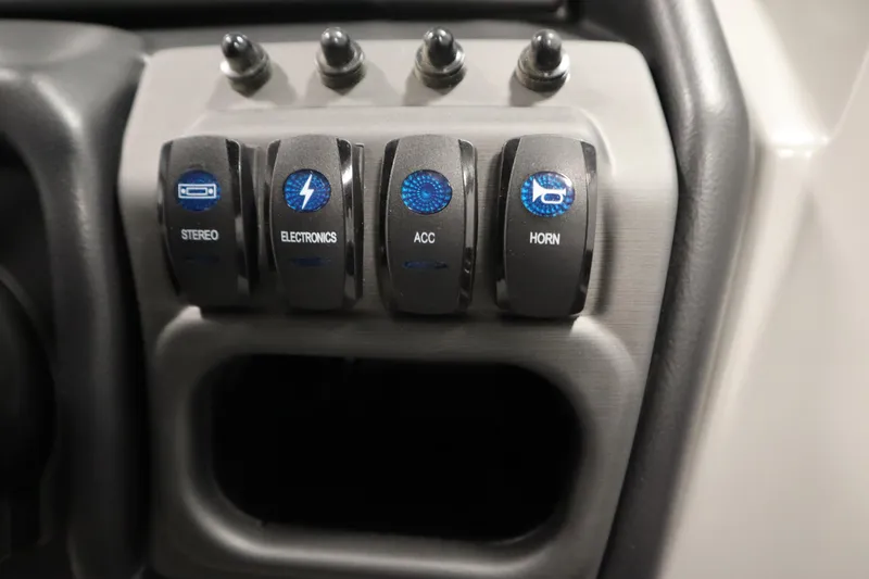 Slide: The Image of Control panel of 2026 Bentley Pontoons Legacy 200 Cruise XL with labeled switches. - 22