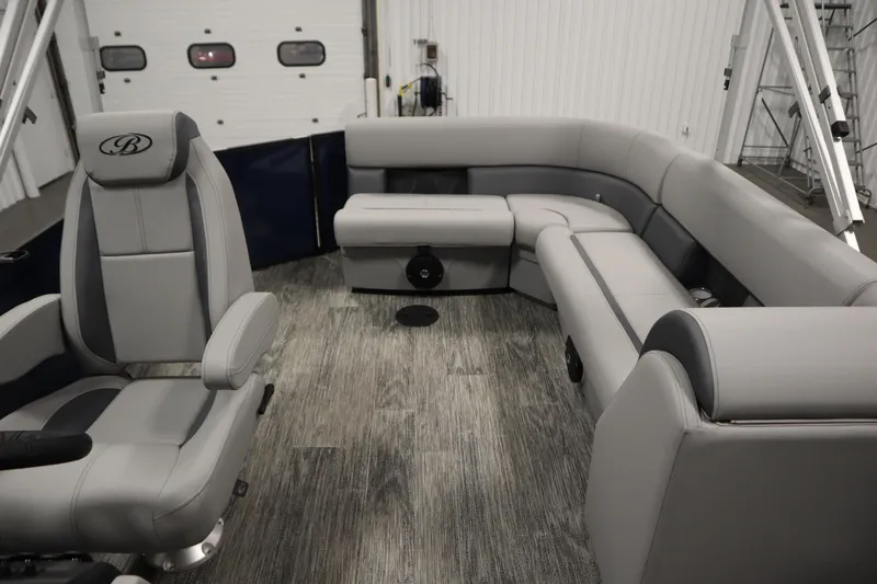Slide: The Image of 2026 Bentley Pontoons Legacy 200 Cruise XL interior with luxurious gray seating and modern design. - 26
