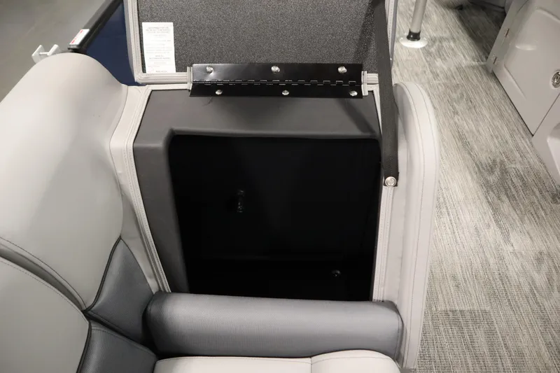 Slide: The Image of 2026 Bentley Pontoons Legacy 200 Cruise XL interior storage compartment with gray seating. - 27