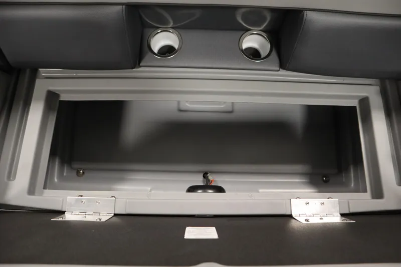 Slide: The Image of 2026 Bentley Pontoons Legacy 200 Cruise XL storage compartment with cup holders. - 28