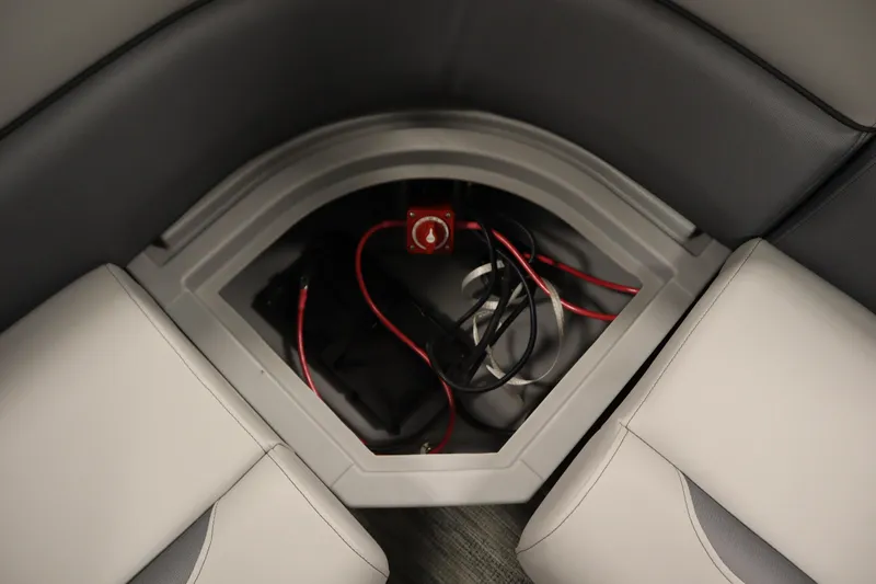 Slide: The Image of Battery compartment of 2026 Bentley Pontoons Legacy 200 Cruise XL with wiring and switch. - 29