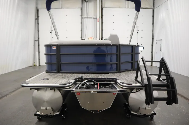 Slide: The Image of 2026 Bentley Pontoons Legacy 200 Cruise XL in a showroom, rear view. - 5