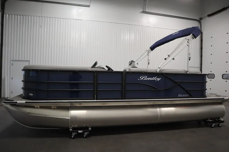 Slide: The Image of 2026 Bentley Pontoons Legacy 200 Cruise XL in a showroom, side view. - 7
