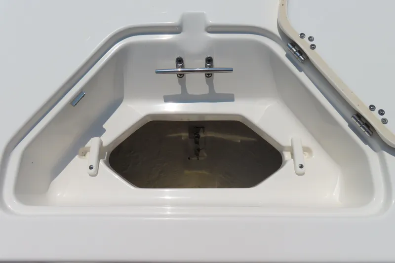 Slide: The Image of Open storage compartment on a 2017 Key West 203 FS boat. - 13
