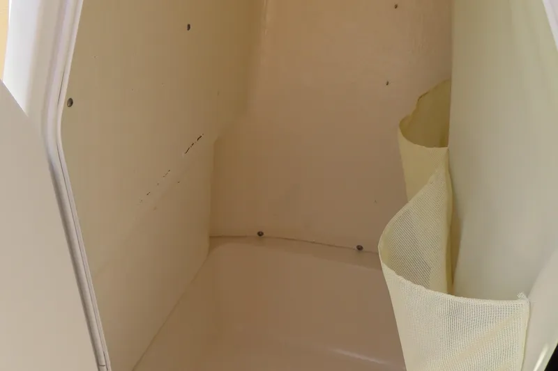 Slide: The Image of Interior storage compartment of 2017 Key West 203 FS boat. - 20