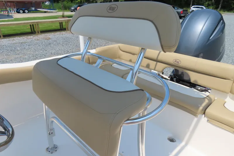 Slide: The Image of 2017 Key West 203 FS boat seat with beige and white upholstery, chrome accents. - 22