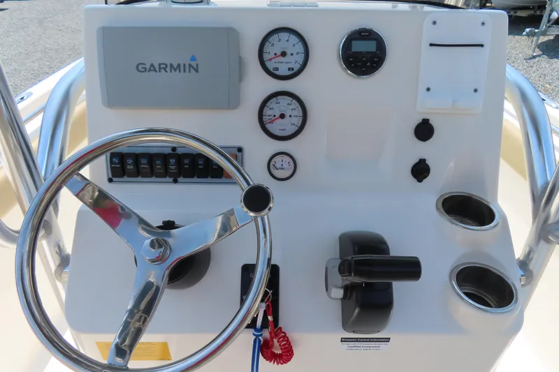 Slide: The Image of Steering console of 2017 Key West 203 FS boat with Garmin navigation system. - 24
