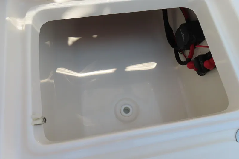 Slide: The Image of 2017 Key West 203 FS boat storage compartment with wiring. - 28