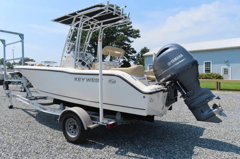 Slide: The Image of 2017 Key West 203 FS boat with Yamaha outboard motor on a trailer. - 3