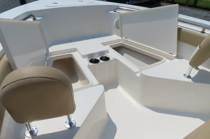 Slide: The Image of 2017 Key West 203 FS boat interior with seating and storage compartments. - 9