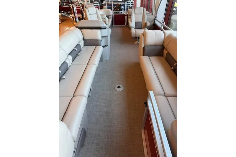 Slide: The Image of 2025 Sun Tracker Party Barge 24 DLX interior with spacious seating and modern design. - 5