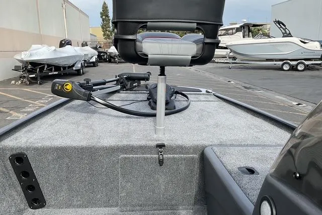 Slide: The Image of 2026 Tracker Bass Tracker Classic XL boat deck with seat and trolling motor. - 10