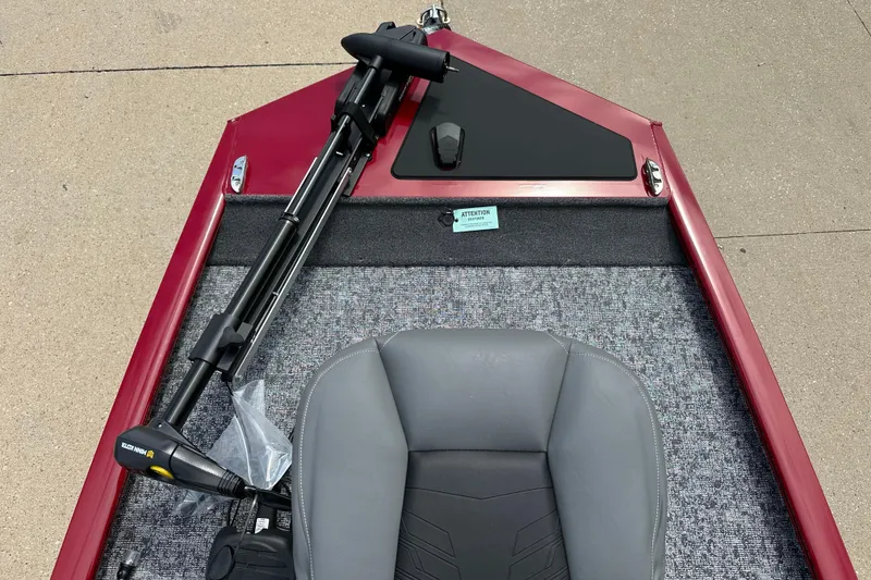 Slide: The Image of 2026 Tracker Pro 170 boat interior with trolling motor and gray seat. - 3