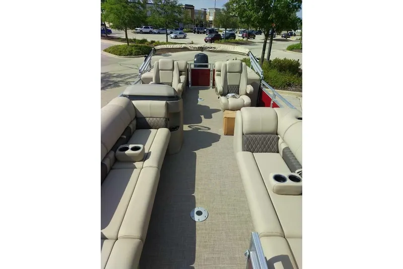 Slide: The Image of 2025 Sun Tracker Party Barge 24 DLX with spacious seating and modern design. - 2