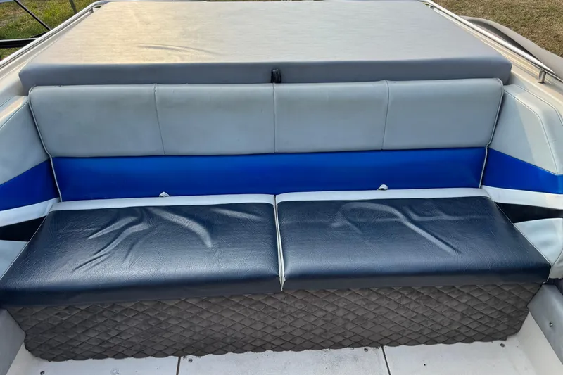 Slide: The Image of 1984 Formula 272 boat seating with blue and gray upholstery. - 9