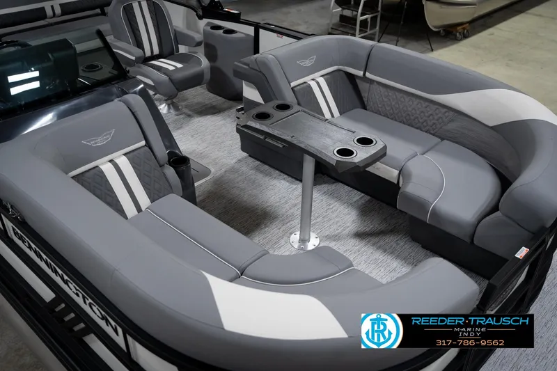 Slide: The Image of 2026 Bennington 22 MSB pontoon boat interior with gray seating and table. - 12
