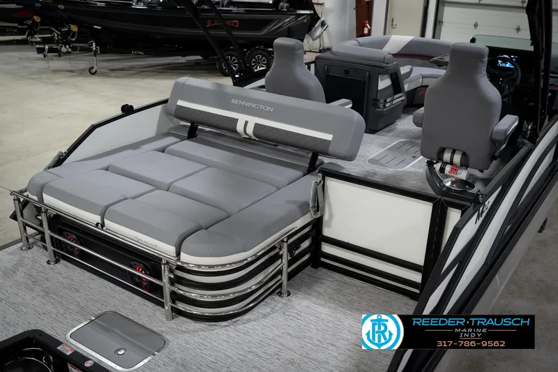 Slide: The Image of 2026 Bennington 22 MSB boat interior with gray seating and modern design. - 13
