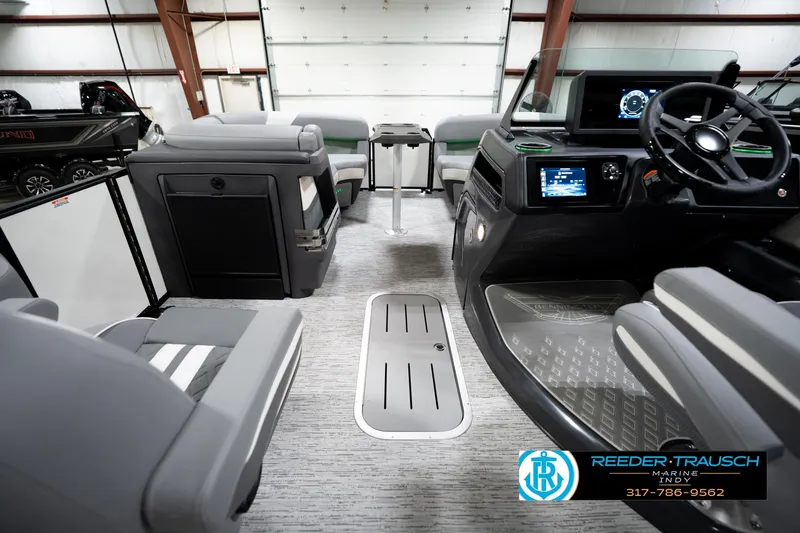 Slide: The Image of Interior of 2026 Bennington 22 MSB boat with modern dashboard and seating. - 19