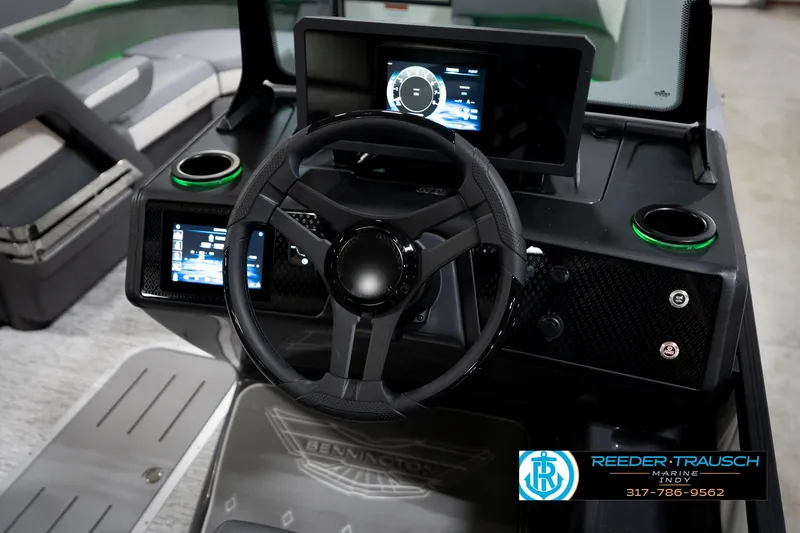 Slide: The Image of 2026 Bennington 22 MSB boat dashboard with modern controls and digital displays. - 32