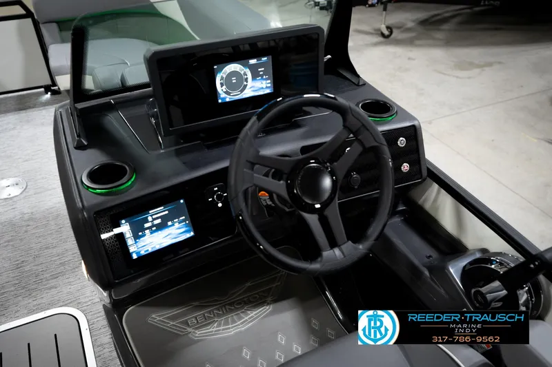 Slide: The Image of 2026 Bennington 22 MSB boat dashboard with modern controls and digital displays. - 33